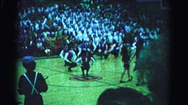 1962: spectators watch a dance number inside the basketball court