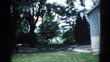 1962: i saw a house a lady in the back yard .some nice tree CHICAGOLAND AREA