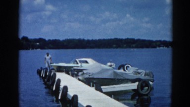1962: a boat is seen approaching a pathway CHICAGOLAND AREA