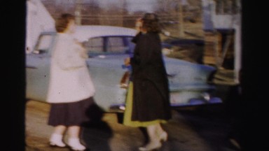 1956: Women and Child Exit Car in Driveway and Pose for Picture Madison