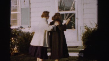 1956: Mother Teaches Her Son How to Push in Madison, Wisconsin
