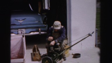 1956: grandpa fixes the lawnmower MADISON, WISCONSIN