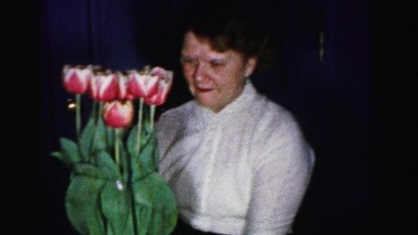 1956: a mother is seen with flowers MADISON, WISCONSIN