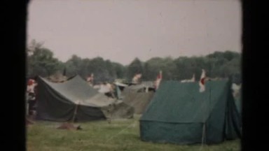 1966: Tents Erected on Grassy Field Fringed by Trees in Hagerstown
