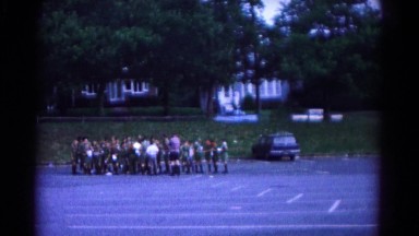 1966: a group of kids hanging out in the parking lot with cars HAGERSTOWN