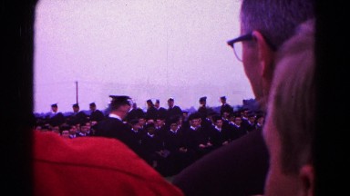 1966: watching a long line of students take their graduation walk to receive