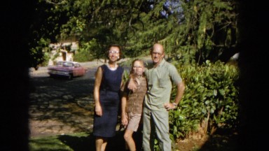 1964: a family is seen going on a trip with a small child HAWAII
