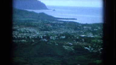 1964: enjoying the beautiful scenery from atop of a mountain to see the valley