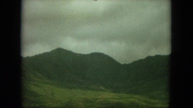 1964: cloudy green tropical mountain day zoom in HAWAII