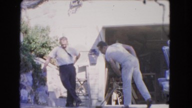 1966: Two Guys Washing Driveway with Broom in Catalina, California