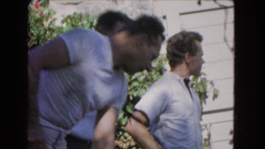 1966: Several Young Men Outdoors Shoveling or Raking on Catalina Island