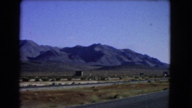 1966: a beautiful mountain ridgeline as seen through the window of a moving car