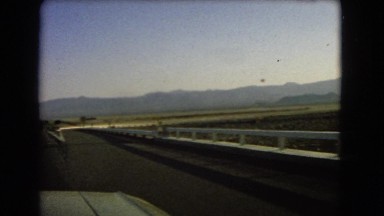 1966: a beautiful mountain ridgeline as seen through the window of a moving car