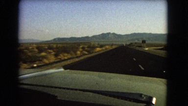 1966: a beautiful mountain ridgeline as seen through the window of a moving car