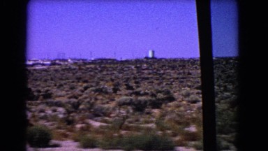 1966: journey beside a vast barren land edged by an industrial area CATALINA