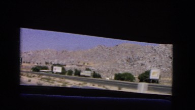 1966: a road is seen having flags along CATALINA, CALIFORNIA