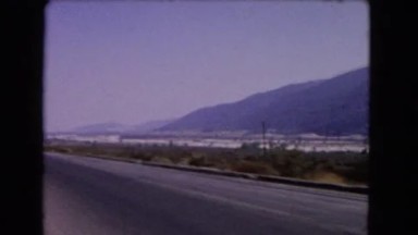 1966: a beautiful mountain ridge as seen through the window of a moving vehicle