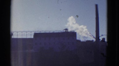 1952: An Urban Factory Scene with Someone Watching San Francisco, California