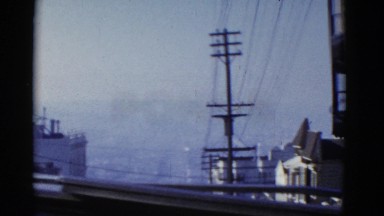 1952: a city urban street as seen from a moving vehicle SAN FRANCISCO,