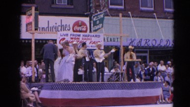 1964: band playing on stage with women in dresses RACINE, WISCONSIN