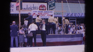 1964: Several Men in Suits Moving with Instruments at Harvard, Illinois Country Music Festival
