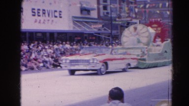 1964: Vintage Video of Parade Float Featuring the Milk Queen in Harvard, Illinois
