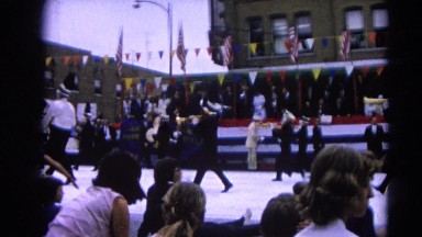 1964: marching band in a parade route HARVARD, ILLINOIS