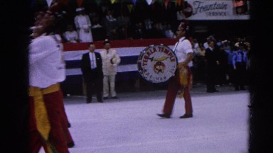 1964: milk days parade man hitting drums marching proudly HARVARD, ILLINOIS