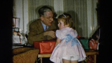 1956: rambunctious kids gathered around grandfather HICKSVILLE, NEWYORK