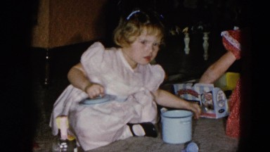 1956: two small girls playing with their new play-kitchen. HICKSVILLE, NEWYORK