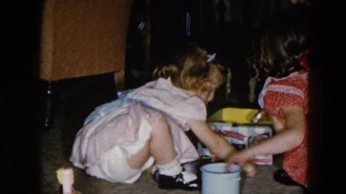 1956: two small girls playing in the living room HICKSVILLE, NEWYORK