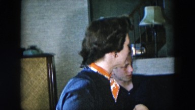 1956: little girl playing with her toys in front of family HICKSVILLE, NEW YORK