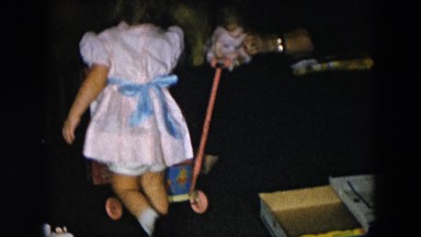 1956: Mother watching daughter learn and play HICKSVILLE, NEW YORK