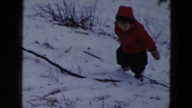 1956: happy child playing in winter weather HICKSVILLE, NEW YORK