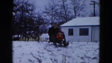 1956: a snow play on a sled HICKSVILLE, NEWYORK