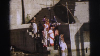1962: People of Calcutta Peering Into Water Unsure If It Is Clean