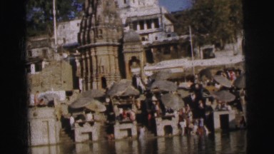 1962: people are seen bathing in some ritual or so and a boat seem passing by