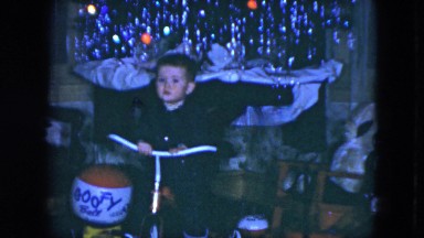 1951: confused ginger toddler evades questions about who farted and smiles.