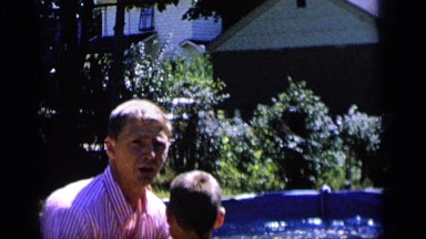 1964: Kid Being Thrown in Pool by Dad in Camden New Jersey