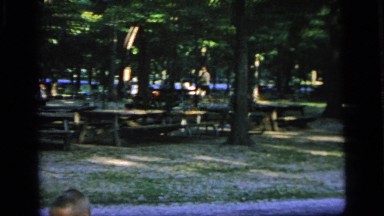 1964: Joyful Children Racing Across Joined Picnic Tables at Park