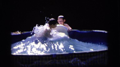 1964: two boys are playing in a pool CAMDEN NEW JERSEY
