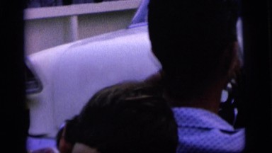 1964: people are getting ready for party in the car CAMDEN NEW JERSEY