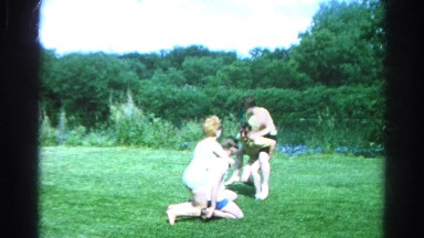 1966: twou couples having fun next to a river, vintage clip