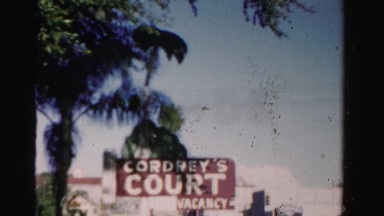 1955: Hotel Sign Shows Vacant Rooms Miami Florida