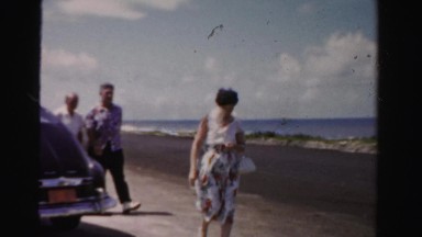 1955: Family Leaving Beach Dad Drunk Being Crazy Silly Miami, Florida