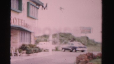 1955: motel parking lot located off busy street MIAMI, FLORIDA
