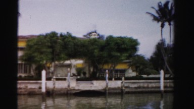 1955: apartments on the shore of canal with rich water MIAMI, FLORIDA