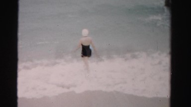 1955: old guy getting out of the water MIAMI, FLORIDA