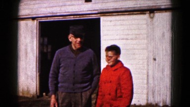 1961: father boy winter dress barn smile waiting to play HAGERSTOWN, MARYLAND