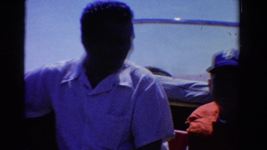 1958: Dad Son and Uncle on Boating Trip Wearing Lifejackets Minnesota
